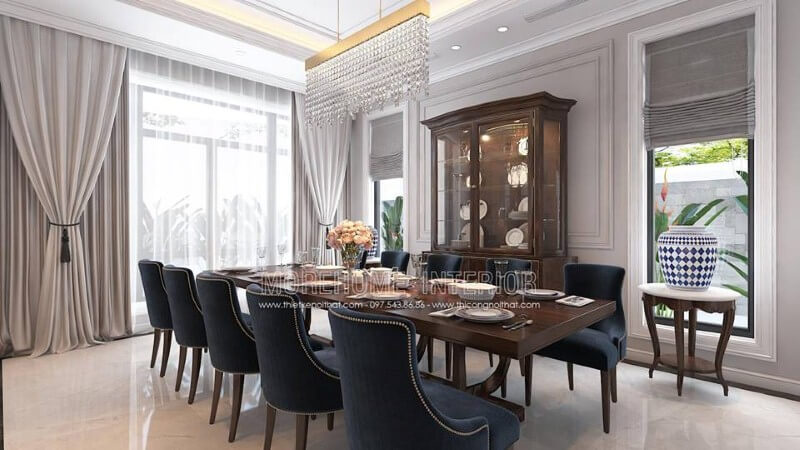 Sắp xếp nội thất phòng ăn phòng ăn tân cổ điển đẹp, quý phái với không gian bàn ăn dành cho 10 người nhưng vẫn rộng rãi thông thoáng. thiết kế biệt thự